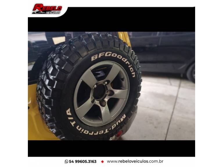 SUZUKI - JIMNY - 2013/2014 - Amarela - R$ 69.900,00